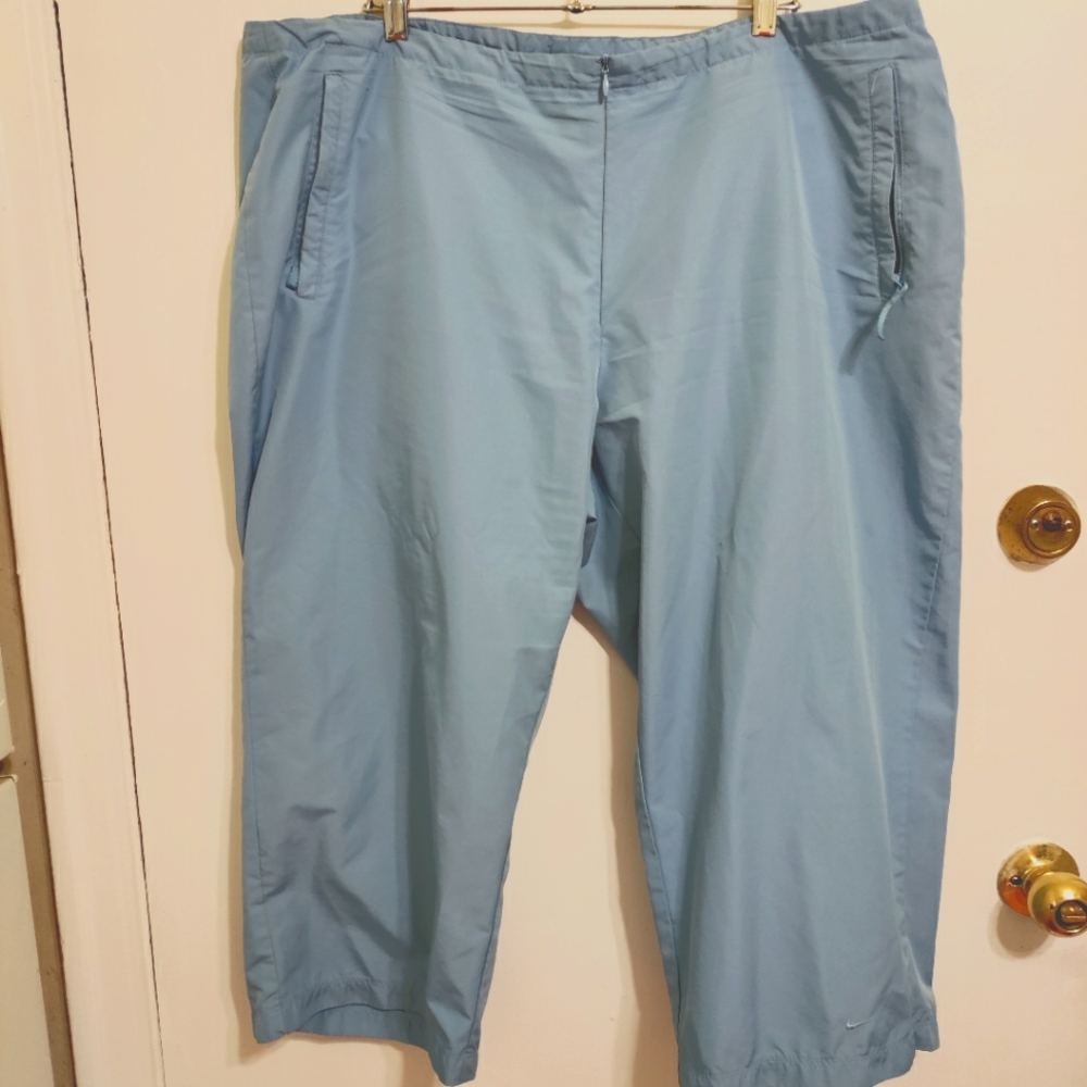 Nike 3/4 length athletic pants. Size XL/16-18. Blue.  100% Nylon